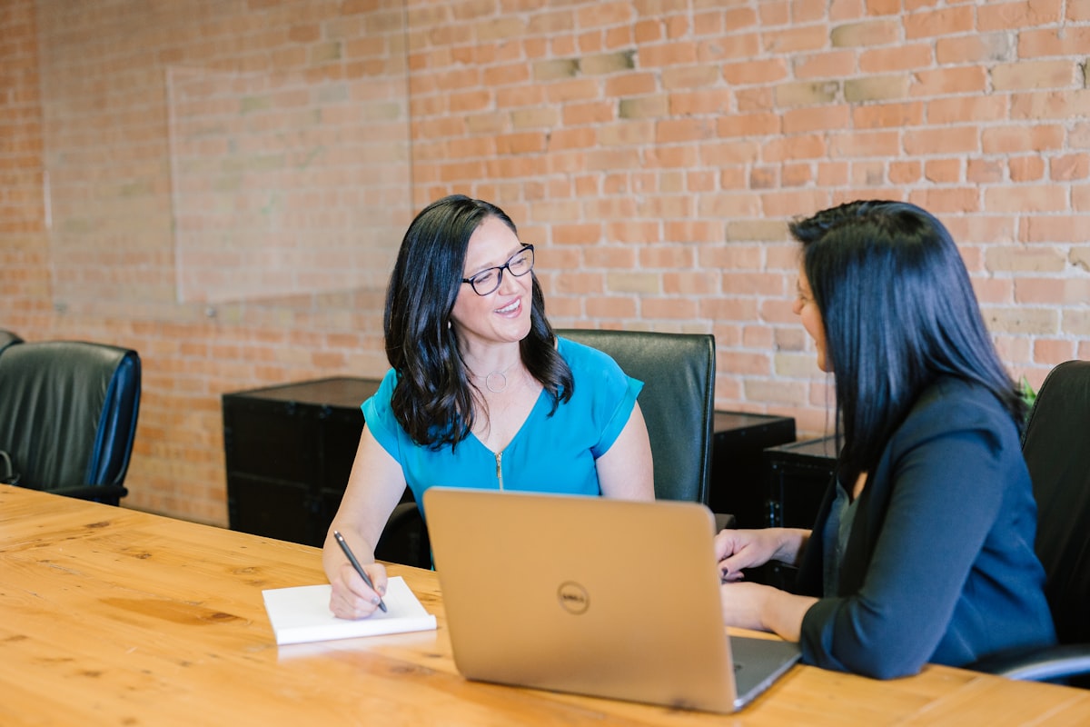 Executive briefing session between a communications advisor and a company spokesperson