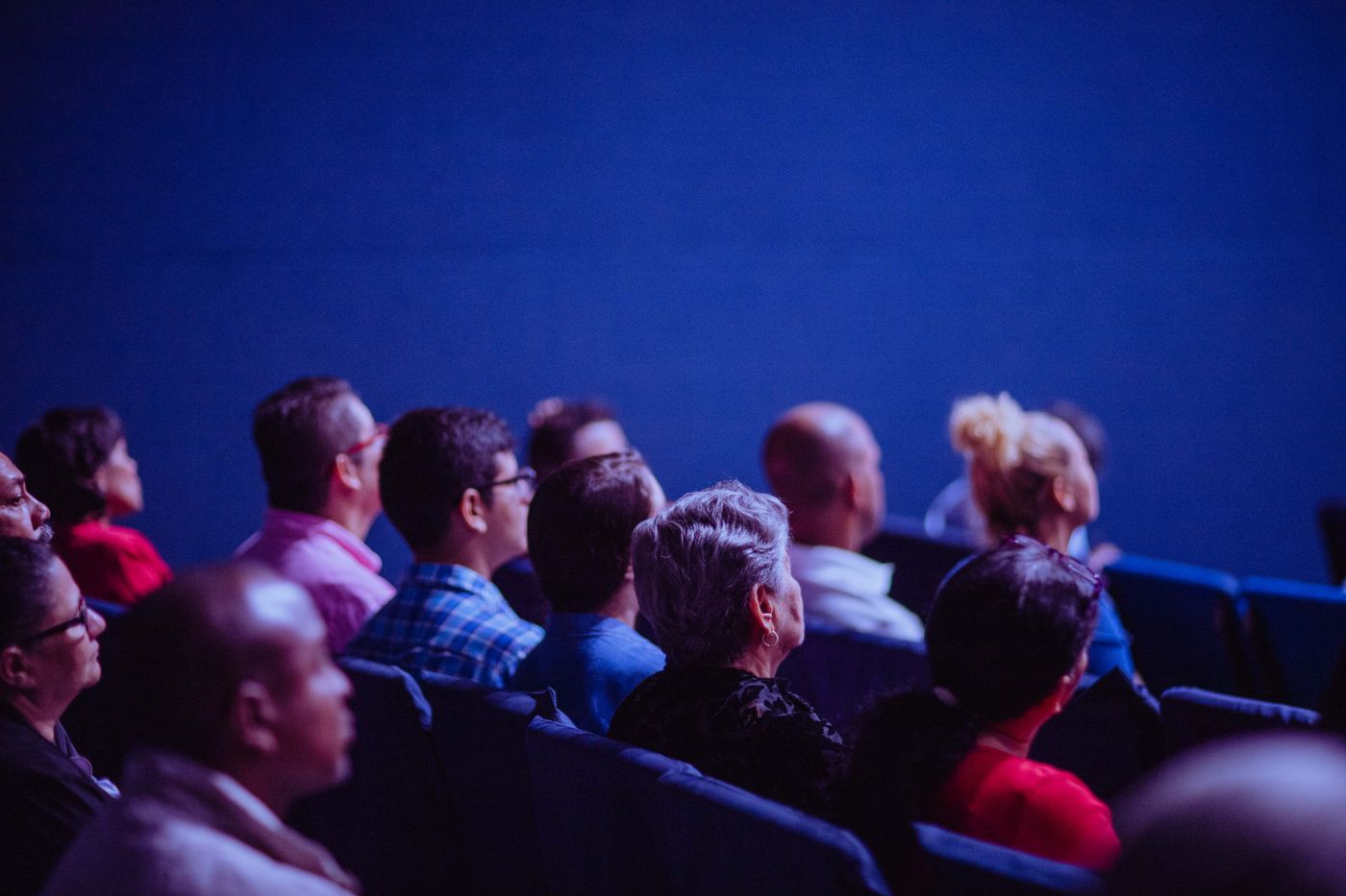 Audience at a funding announcement briefing for a technology company